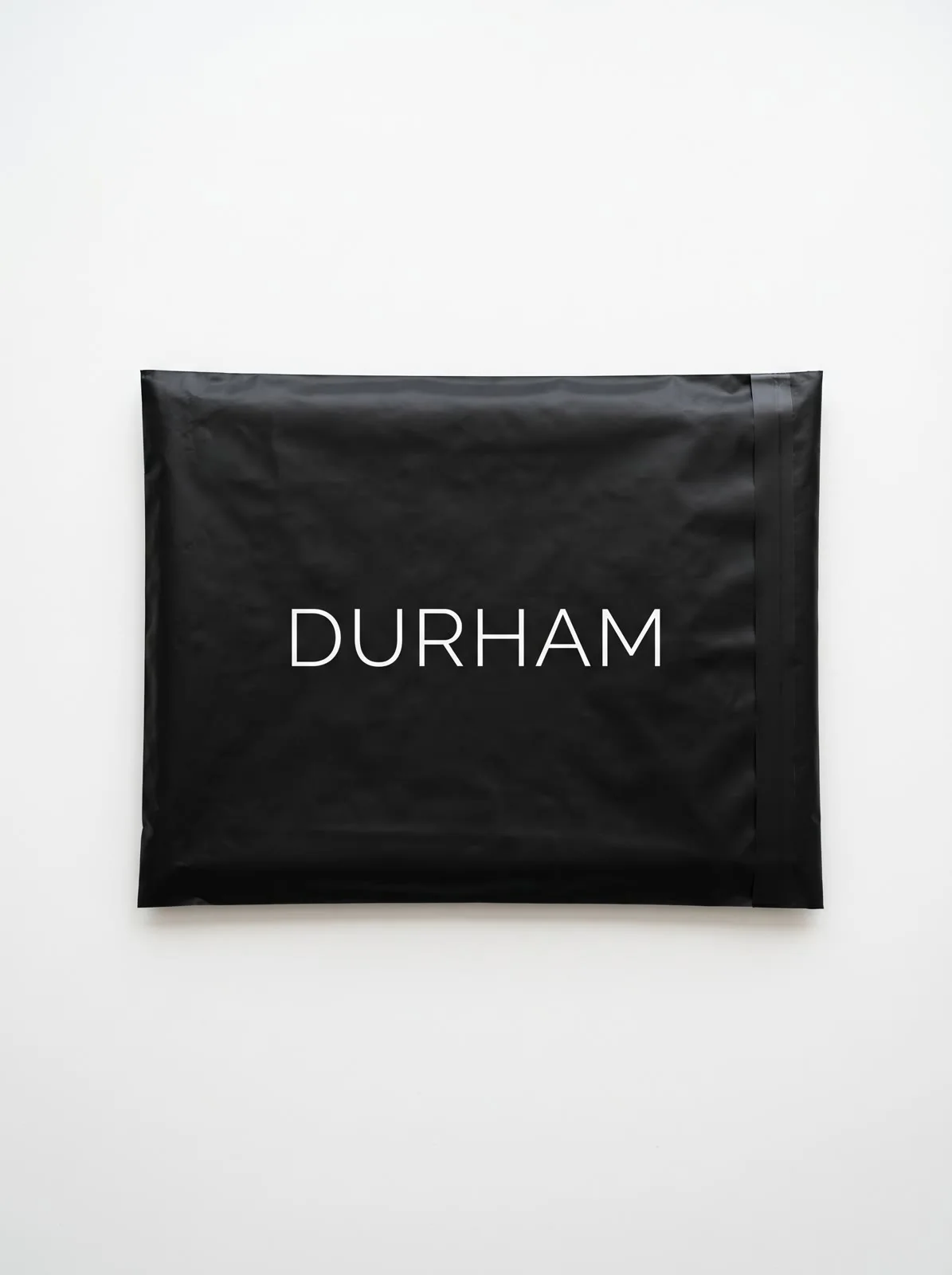 DURHAM black mailer bag